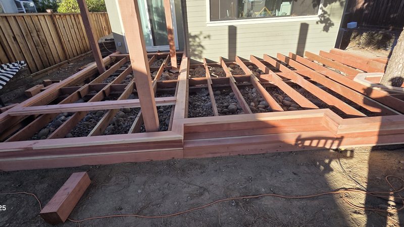 Joists a few inches off the ground, framed around a tree, San Jose
