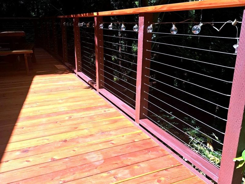 Redwood cable railing on a redwood deck, built by MS Construction and Services