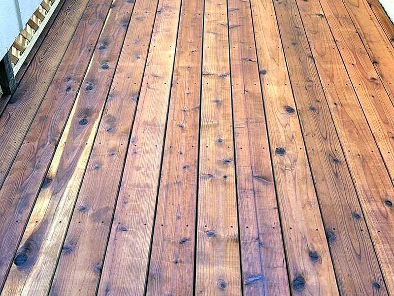 Cedar-tone stain on a side-yard deck, by MS Construction and Services