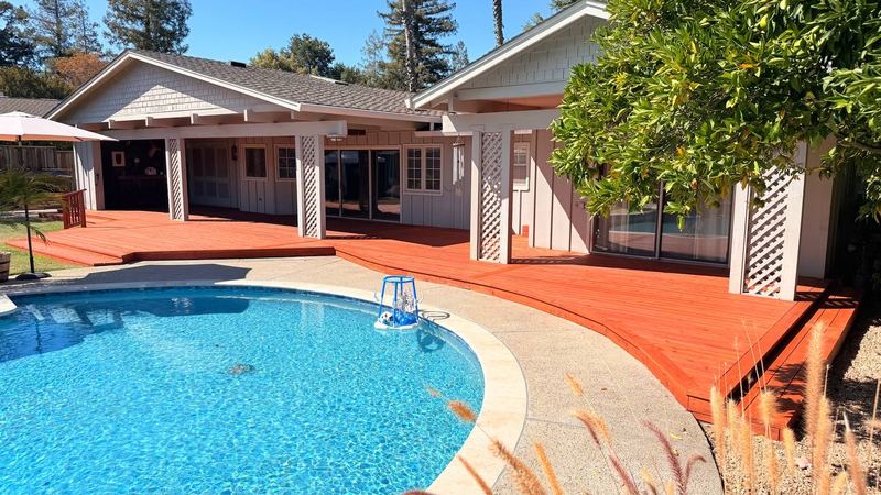 The full deck wrapping the pool