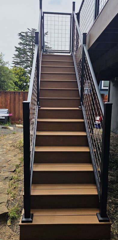 Stairs with mesh railing