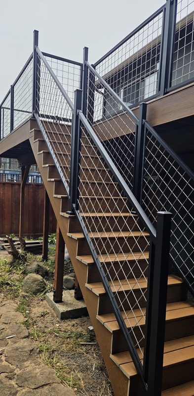 The deck and stairs from the yard
