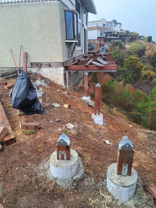 Old posts, new footings