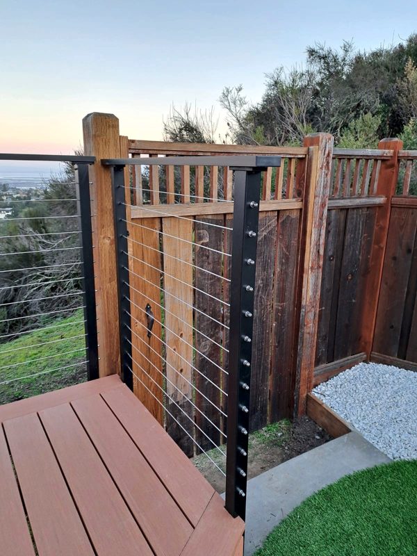 Step and railing by the gate