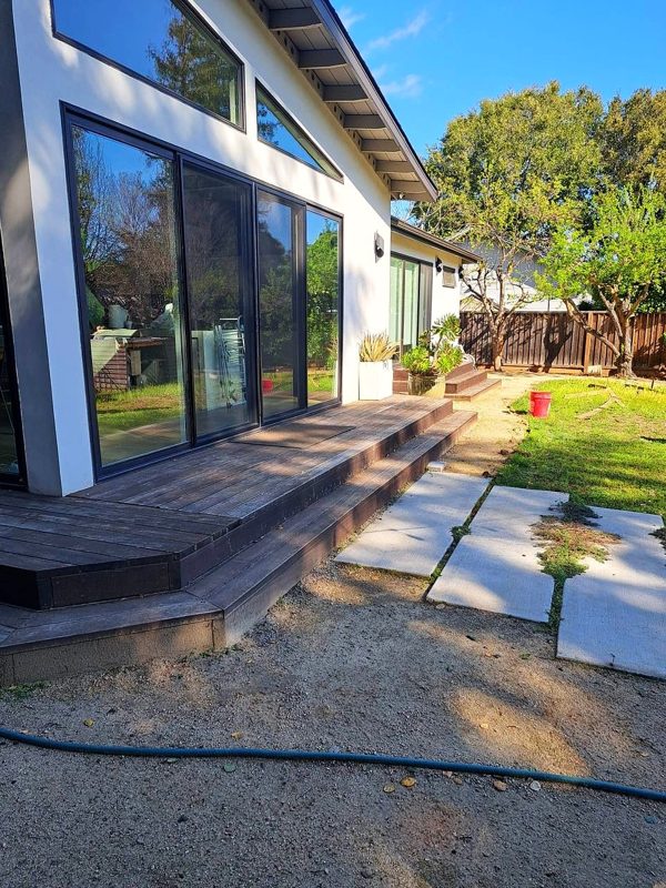 Old deck steps down to the yard