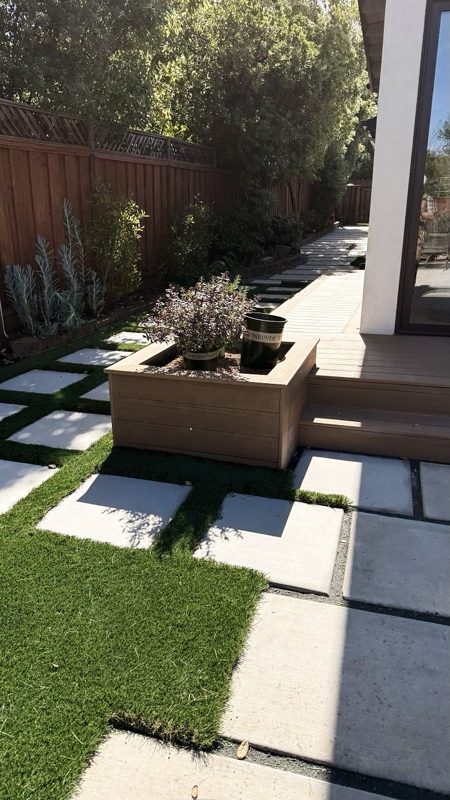 Planter at the foot of the steps
