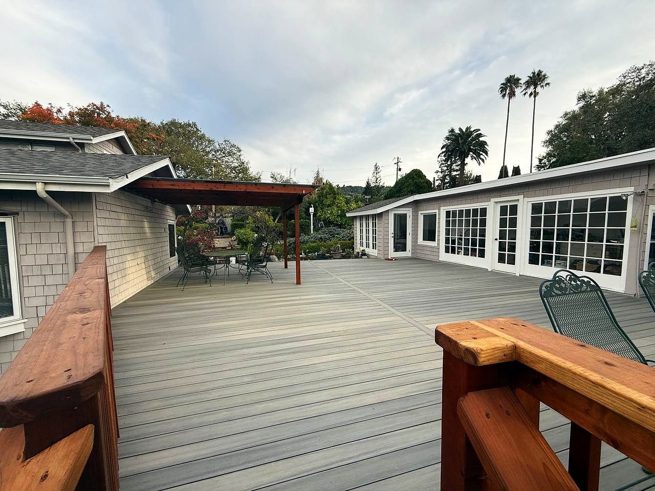 Los Gatos — Elevated composite deck with a redwood pergola