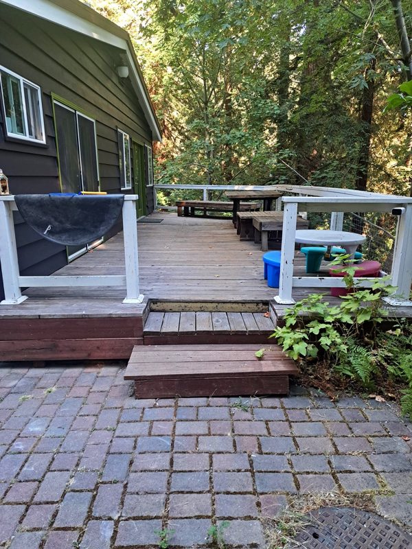 The old deck and white railing