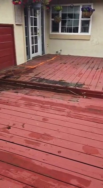 The old deck: red paint peeling everywhere