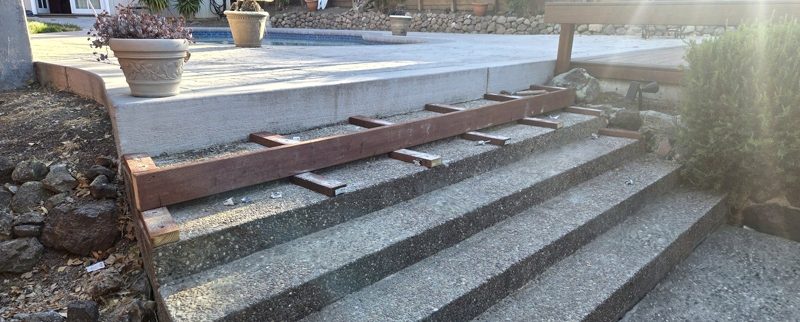 Sleepers over the concrete pool steps