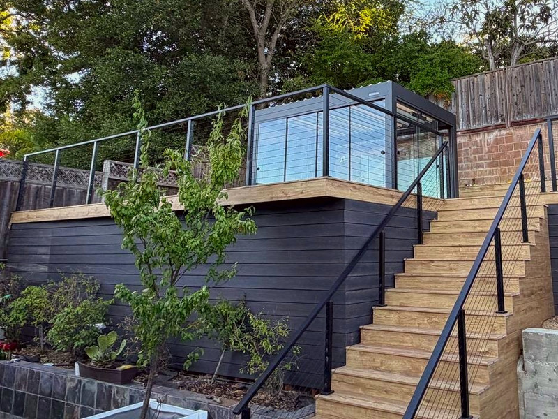 San Carlos: Hillside deck with cable railing and a glass-wall pergola