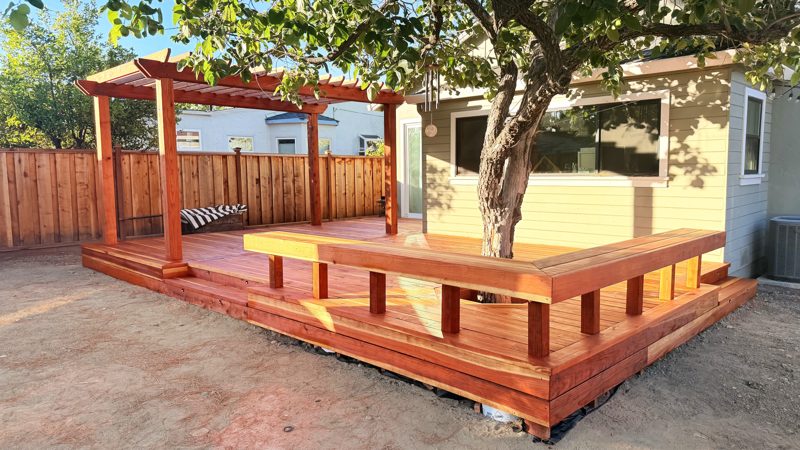 The deck, the bench and the tree